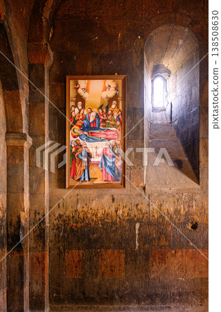Interior of old church with religious painting, stone arches, and soft lighting Interior of old church with religious painting, stone arches, and soft lighting 138508630