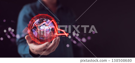 Businessman hand holding virtual world globe with red down arrow graph. Global economic recession concept. Financial crisis, stock market crash, and high inflation business risk background. 138508680