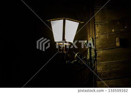 Lighted vintage street lantern at night Lighted vintage street lantern at night 138509162