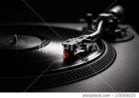 Vinyl record player close up with stylus needle on spinning turntable Vinyl record player close up with stylus needle on spinning turntable 138509223