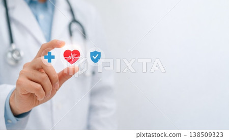 Doctor holding medical icons representing healthcare insurance and protection concept Doctor holding medical icons representing healthcare insurance and protection concept 138509323