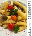 Rotini pasta with meat, mushrooms and tomatoes 138509474