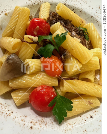 Rotini pasta with meat, mushrooms and tomatoes Rotini pasta with meat, mushrooms and tomatoes 138509474