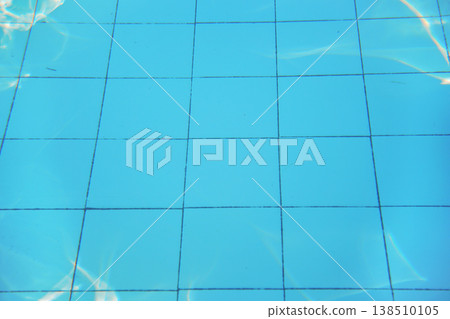 Azure blue swimming pool old tiled floor, sun reflects on ground, underwater photo - abstract holiday background 138510105