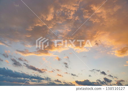 Orange pink evening sky just after sunset - afternoon clouds background Orange pink evening sky just after sunset - afternoon clouds background 138510127