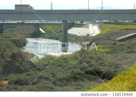 East side of Shinmei Bridge. The plaque shines in the gentle, soft sunlight (April 1, 2022). Embankment paving work. Left bank of Koyama River. East side of Shinmei Bridge. The plaque shines in the gentle, soft sunlight (April 1, 2022). Embankment paving work. Left bank of Koyama River. 138510484