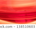 peering into the glass container 138510603