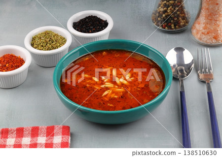 Traditional Turkish Orzo Soup with Tomato Paste and Dried Mint, Warm Homemade Vegetable Broth Base Traditional Turkish Orzo Soup with Tomato Paste and Dried Mint, Warm Homemade Vegetable Broth Base 138510630