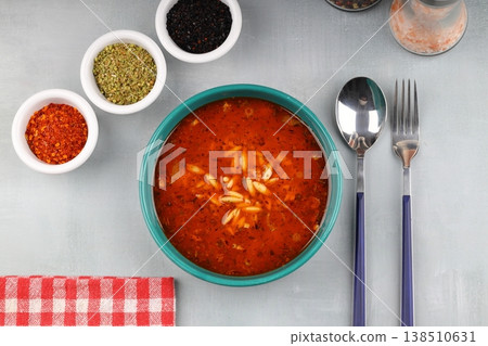 Traditional Turkish Orzo Soup with Tomato Paste and Dried Mint, Warm Homemade Vegetable Broth Base Traditional Turkish Orzo Soup with Tomato Paste and Dried Mint, Warm Homemade Vegetable Broth Base 138510631