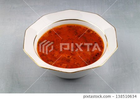 Traditional Turkish Orzo Soup with Tomato Paste and Dried Mint, Warm Homemade Vegetable Broth Base Traditional Turkish Orzo Soup with Tomato Paste and Dried Mint, Warm Homemade Vegetable Broth Base 138510634
