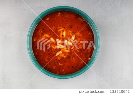 Traditional Turkish Orzo Soup with Tomato Paste and Dried Mint, Warm Homemade Vegetable Broth Base Traditional Turkish Orzo Soup with Tomato Paste and Dried Mint, Warm Homemade Vegetable Broth Base 138510641