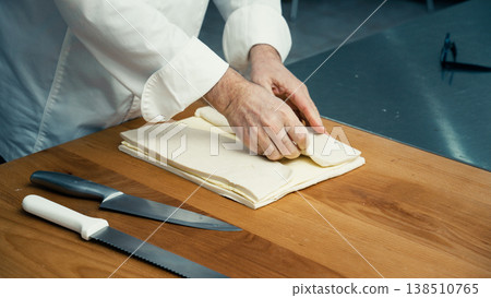French pastry chef hands working dough 138510765