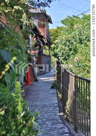 A narrow summer shortcut A narrow summer shortcut 138510796