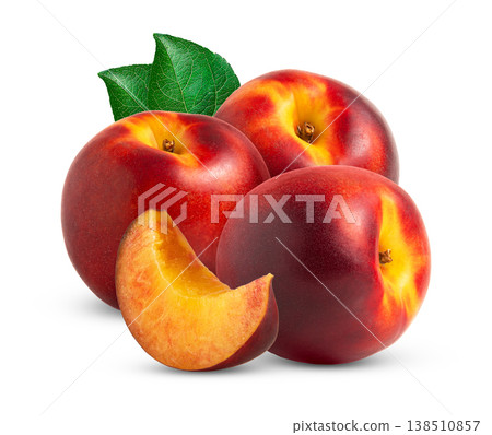 Whole red nectarine peaches and slice of nectarine with green leaf isolated. Nectarine fruit and cut in a slice of nectarine peach with leaves and clipping path. 138510857