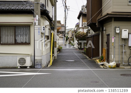 A small street on a city street corner A small street on a city street corner 138511289