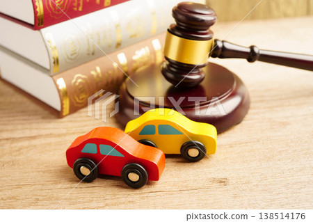 Bangkok, Thailand March 15, 2023 Car accident lawsuit and insurance, Judge hammer with car model. 138514176