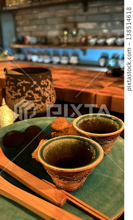 Cocktails and tea served in Ryukyu pottery. Cocktails and tea served in Ryukyu pottery. 138514618