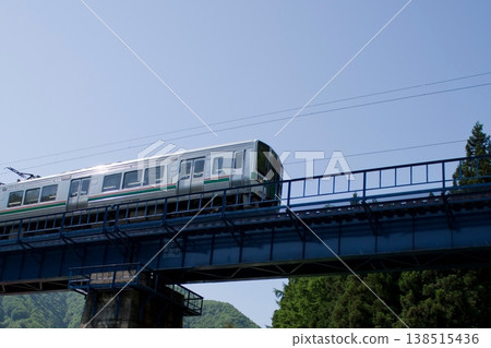 Local train bound for Yonezawa 138515436