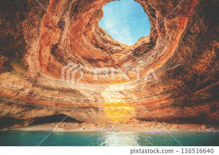 Coastal rocky seascape, view inside the cave Benagil in Algarve region in the Atlantic Ocean, Portugal, Europe Coastal rocky seascape, view inside the cave Benagil in Algarve region in the Atlantic Ocean, Portugal, Europe 138516640