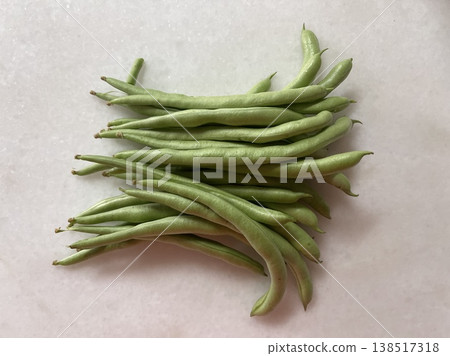 Top View Of Fresh Harvested Green Beans Phaseolus Vulgaris On White Surface Top View Of Fresh Harvested Green Beans Phaseolus Vulgaris On White Surface 138517318