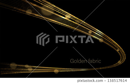 An isolated gold arc of fine, glittering tinsel on a black background An isolated gold arc of fine, glittering tinsel on a black background 138517614