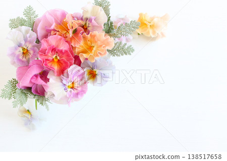 A pansy arrangement in soft colors A pansy arrangement in soft colors 138517658
