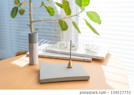 Incense, incense sticks, and fragrance on the living room table. Incense, incense sticks, and fragrance on the living room table. 138517733