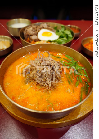 Traditional Korean Spicy Beef Soup Yukgaejang in Brass Bowl, Shredded Beef with Scallions in Red Chili Broth, Authentic K-Food Hangover Soup Traditional Korean Spicy Beef Soup Yukgaejang in Brass Bowl, Shredded Beef with Scallions in Red Chili Broth, Authentic K-Food Hangover Soup 138518772