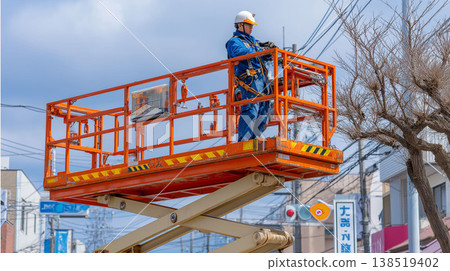 A work scene that conveys the safety awareness and sense of responsibility of workers working with large machinery in industrial settings. 138519402