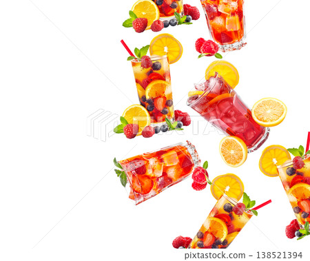 Savor a refreshing iced raspberry beverage with fruit and mint under the warm summer sun Savor a refreshing iced raspberry beverage with fruit and mint under the warm summer sun 138521394