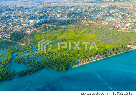 Aerial view of tropical island Zanzibar in the Indian ocean in Tanzania, East Africa Aerial view of tropical island Zanzibar in the Indian ocean in Tanzania, East Africa 138521512