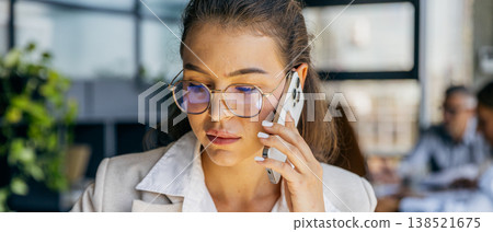 Focused entrepreneur engaged in energetic pitch at business meeting 138521675