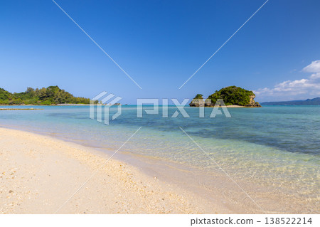 The milky blue sea scenery, including a turtle-shaped islet off the coast of Yagaji Beach on Yagaji Island in Yaga, Nago City, Okinawa Prefecture. The milky blue sea scenery, including a turtle-shaped islet off the coast of Yagaji Beach on Yagaji Island in Yaga, Nago City, Okinawa Prefecture. 138522214