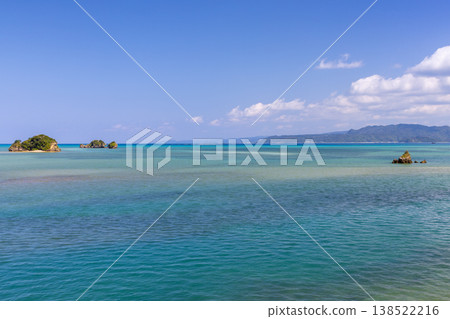The milky blue sea scenery, including a turtle-shaped islet off the coast of Yagaji Beach on Yagaji Island in Yaga, Nago City, Okinawa Prefecture. The milky blue sea scenery, including a turtle-shaped islet off the coast of Yagaji Beach on Yagaji Island in Yaga, Nago City, Okinawa Prefecture. 138522216
