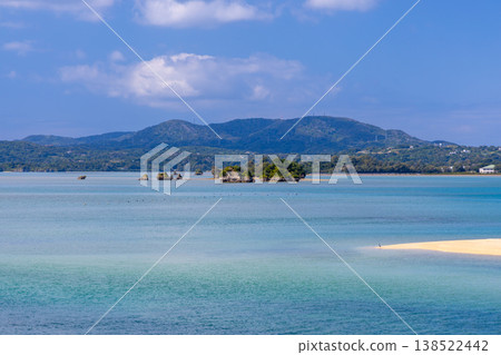 A view of the vibrant blue sea of Haneji Inland Sea from the Yagaji Bridge leading to Yagaji Island in Yaga, Nago City, Okinawa Prefecture. A view of the vibrant blue sea of Haneji Inland Sea from the Yagaji Bridge leading to Yagaji Island in Yaga, Nago City, Okinawa Prefecture. 138522442