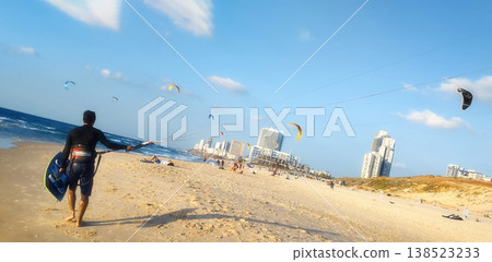 Beach and kite surfer in Israel. Soft focus. Beach and kite surfer in Israel. Soft focus. 138523233