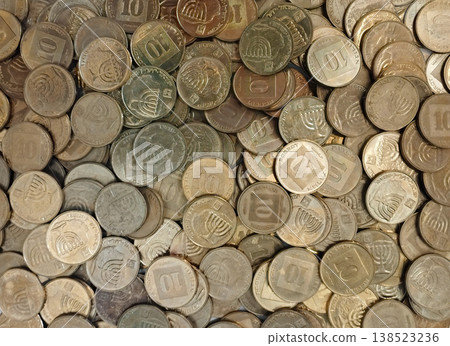 Background from metallic coins. Israeli shekel. selective focus 138523236