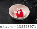 Elegant red mousse dessert with white garnish 138523971