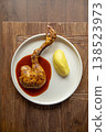 Roasted chicken leg with sauce and puree 138523973