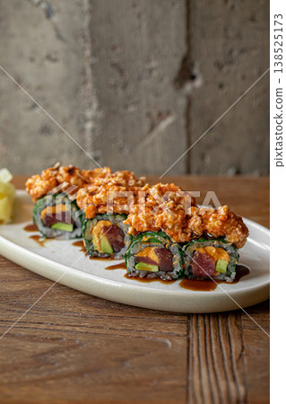 Tuna sushi rolls with shrimp tartare and sauce Tuna sushi rolls with shrimp tartare and sauce 138525173