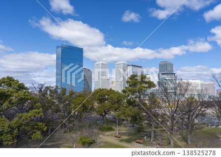 OBP as seen from Osaka Castle Park during cherry blossom season OBP as seen from Osaka Castle Park during cherry blossom season 138525278
