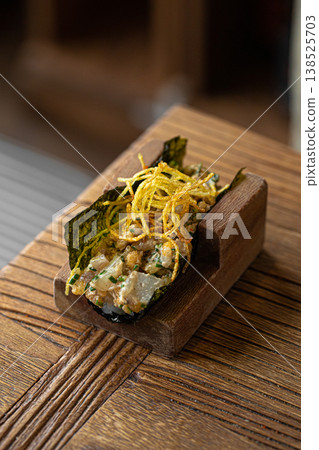 Open sushi roll with white fish and sauce Open sushi roll with white fish and sauce 138525703