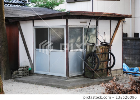 Prefabricated hut in a residential area Prefabricated hut in a residential area 138526096