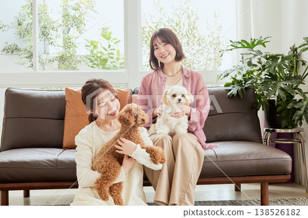 Women living with Toy Poodles and Maltese dogs: A lifestyle with dogs Women living with Toy Poodles and Maltese dogs: A lifestyle with dogs 138526182