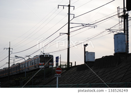 Commuter trains running at dusk Commuter trains running at dusk 138526249