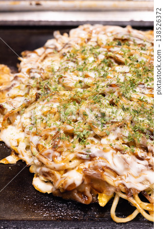Delicious Osaka specialty: Okonomiyaki and Modern Yaki Delicious Osaka specialty: Okonomiyaki and Modern Yaki 138526372