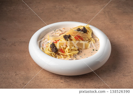Pasta with creamy sauce truffle and parmesan Pasta with creamy sauce truffle and parmesan 138526390