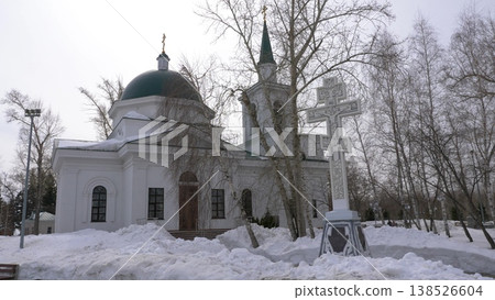 March 22 2026 Barnaul Russia Church of John the Baptist covered in snow cold early spring cityscape religious architecture landmark and winter atmosphere. March 22 2026 Barnaul Russia Church of John the Baptist covered in snow cold early spring cityscape religious architecture landmark and winter atmosphere. 138526604