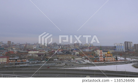 March 22 2026 Barnaul Russia aerial view of city with Old Bazaar and Znamensky Cathedral covered in snow cold early spring urban cityscape and winter atmosphere. March 22 2026 Barnaul Russia aerial view of city with Old Bazaar and Znamensky Cathedral covered in snow cold early spring urban cityscape and winter atmosphere. 138526606