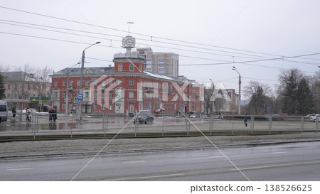 March 22 2026 Barnaul Russia Victory Square building with old clock covered in snow cold early spring urban cityscape historic architecture and winter atmosphere. 138526625